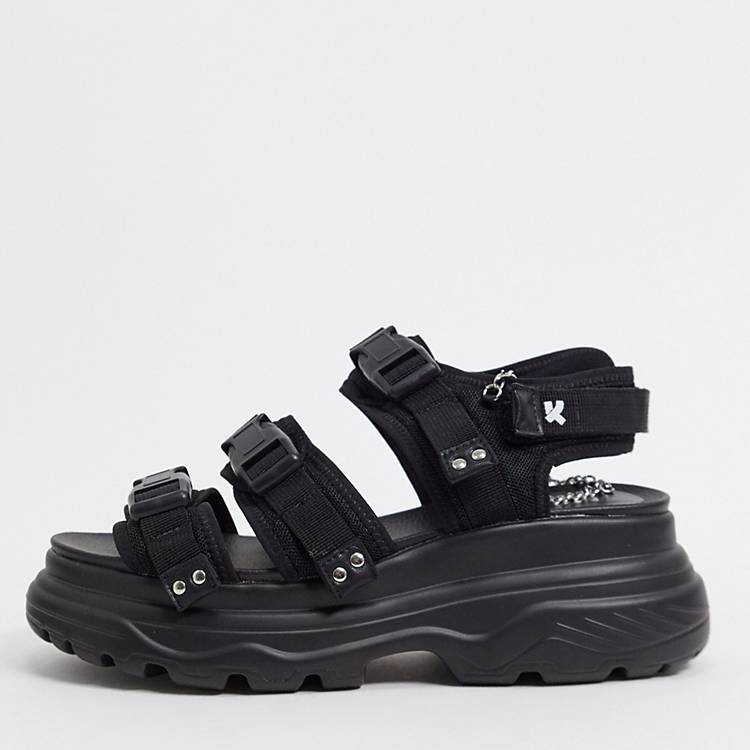 Teoría establecida Chicle Vacilar Sandalias gruesas con tiras con hebillas en negro de Koi Footwear | ASOS