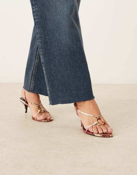 Sandalias minimalistas de tacón con diseño de tiras y estampado animal de Mango - view 1