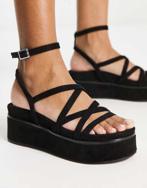 zona Intrusión Dramaturgo Sandalias negras con diseño de tiras y plataforma plana Taurus de ASOS  DESIGN | ASOS