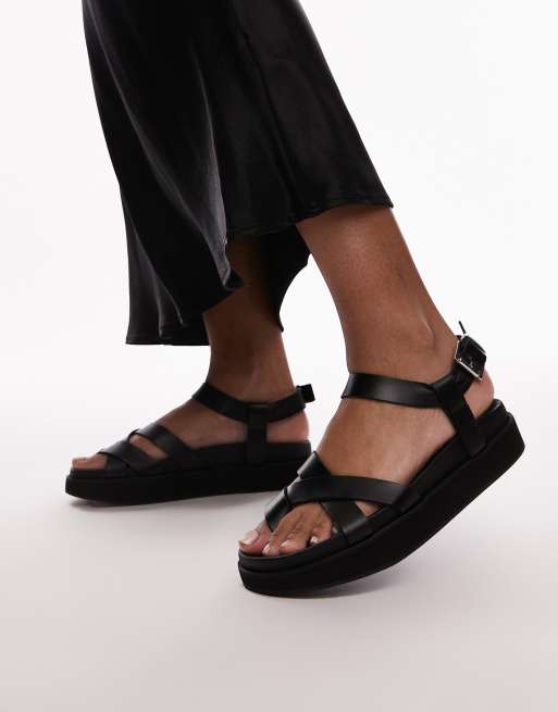 Sandalias negras con diseño de tiras y tira de dedo de cuero premium Jaya de Topshop