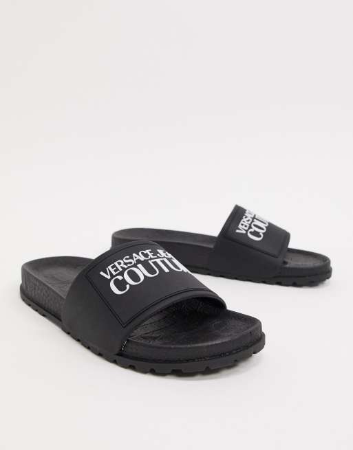 Sandalias negras con logo Couture de Versace Jeans