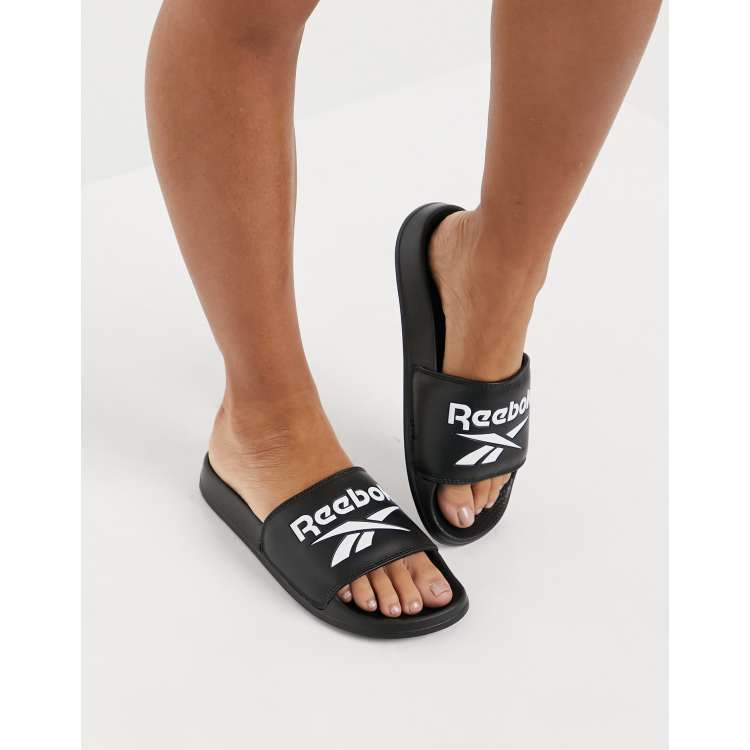 templo Desfiladero Hablar con Sandalias negras con logo de Reebok | ASOS