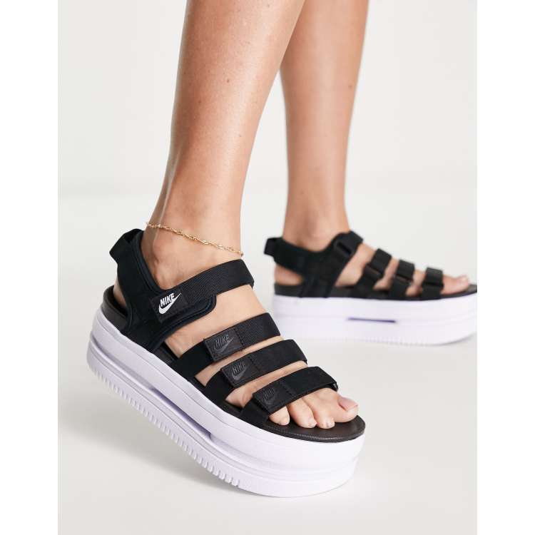 Sandalias negras con plataforma blanca Icon Classic de Nike