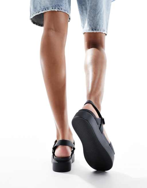 Sandalias negras con plataforma gruesa y plana de poliuretano de