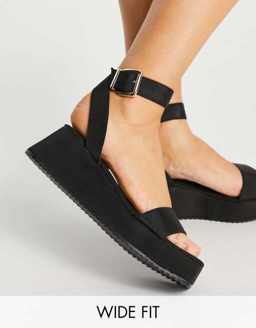 en el medio de la nada Camion pesado judío Sandalias negras con plataforma plana Tatiana de ASOS DESIGN Wide Fit | ASOS