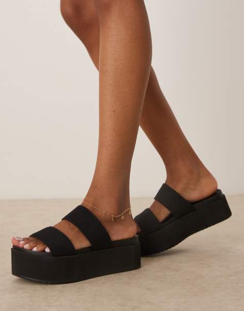 Sandalias negras con plataforma plana y dos correas de Calvin Klein Jeans - view 1