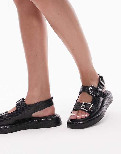 Sandalias negras con tira talonera y hebilla Gen de Topshop