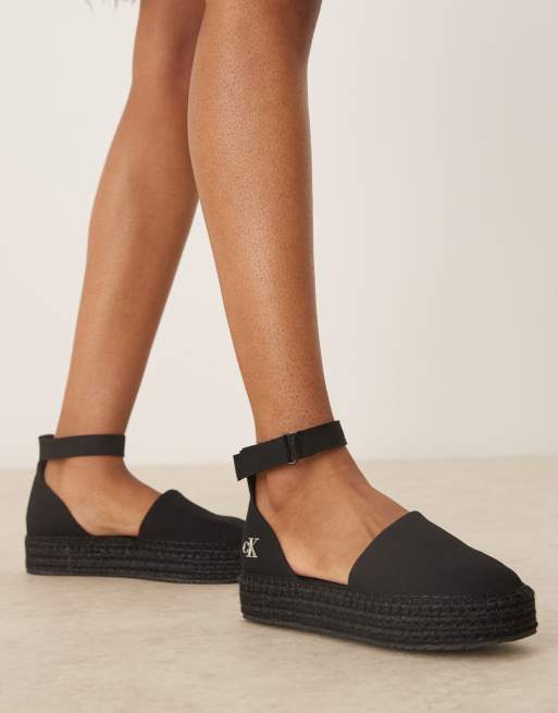 Sandalias negras de estilo alpargatas con plataforma plana de Calvin Klein Jeans