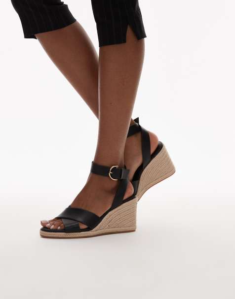 Sandalias negras de tacón de cuña con diseño entretejido de Mango - view 1