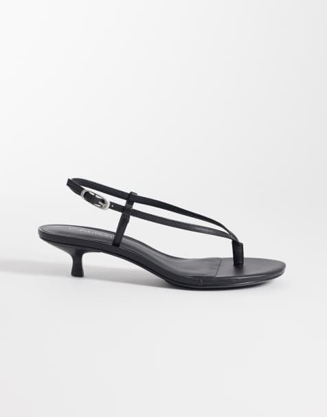 Sandalias negras destalonadas con diseño de tiras de cuero de Calvin Klein Jeans - view 1