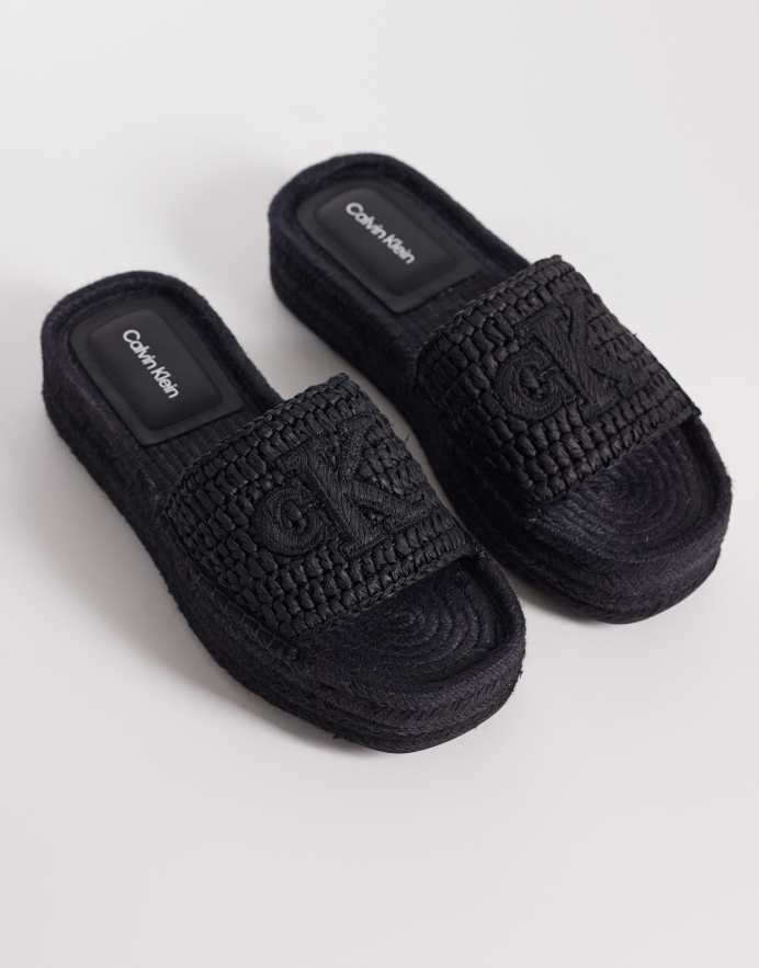 Calvin Klein Sandalias negras estilo alpargatas con plataforma plana de rafia de Jeans
