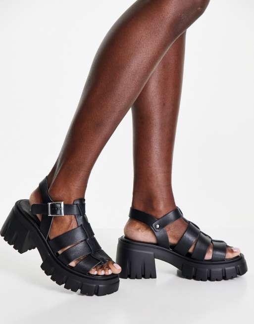 Sandalias negras estilo cangrejeras con tacón y gruesa Hollis de ASOS DESIGN |