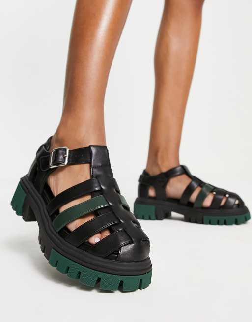 Sandalias negras estilo gladiador con suela verde de Koi Footwear
