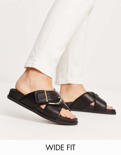 Sandalias negras planas con diseño cruzado en el empeine y hebilla Flash de ASOS DESIGN Wide Fit - BLACK - view 1