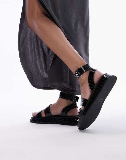 Sandalias negras planas efecto piel cocodrilo con detalle Grace de Topshop | ASOS