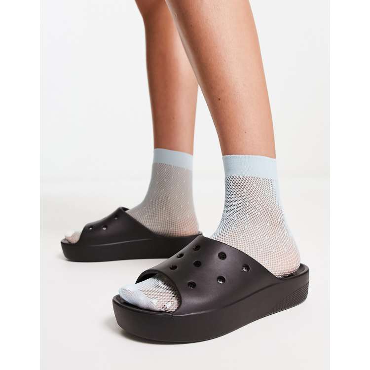 Crocs negras best sale con blanco