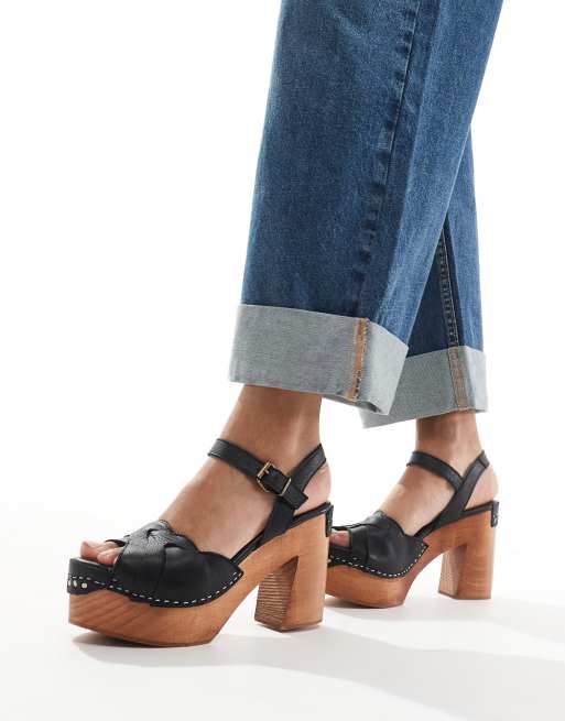 Sandalias negras tipo zuecos con plataforma de cuero de Free People