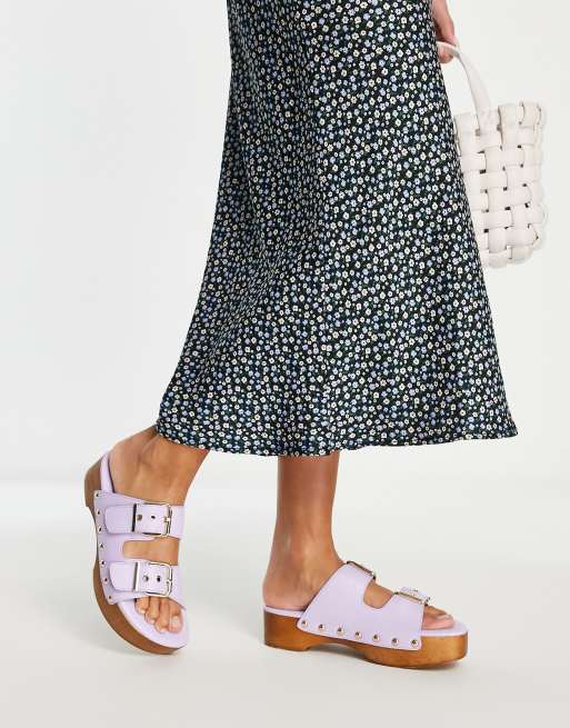 Sandalias rosas estilo mules con suela tipo zueco y tiras con hebillas Hellena de RAID