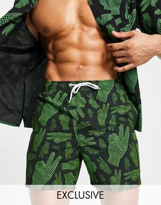Santa Cruz all over atomic peace swim shorts in black/green exclusive at ASOS