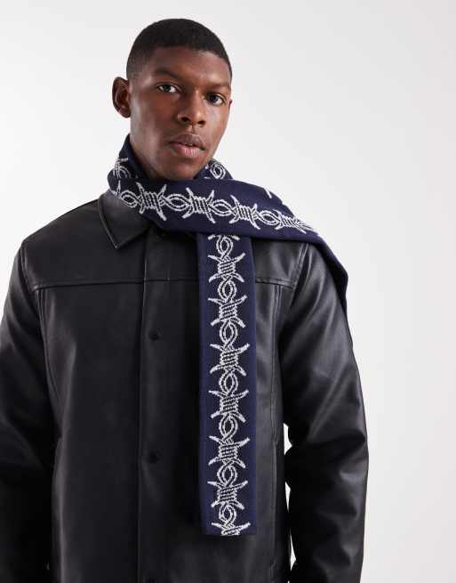 Santa Cruz – Blå, ribbstickad halsduk med taggtrådsmotiv