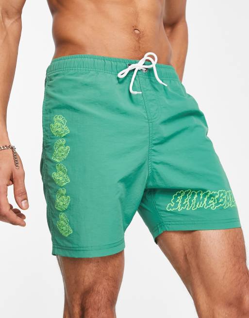 Santa Cruz – Gröna badshorts med placerade tryck