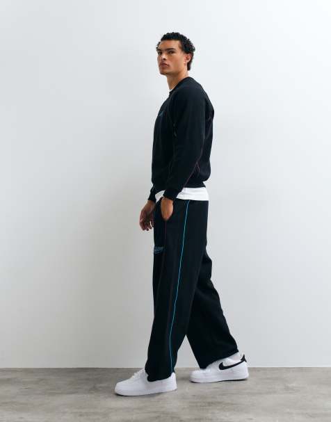 Santa Cruz pinstripe wide leg trackies in black (part of a set) - view 1