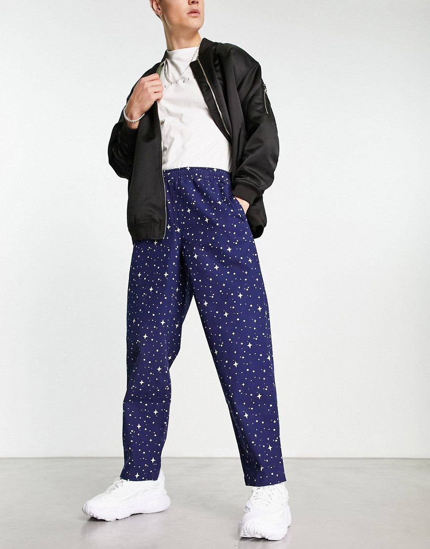 Santa Cruz tab pant trousers in navy with all over print