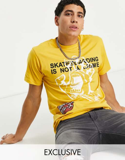 Santa Cruz – Żółty T-shirt z nadrukami na całej powierzchni – tylko w ASOS