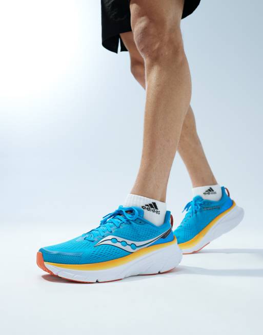 Saucony - Guide 17 - Hardloopsneakers met structuur en demping in blaiuw en geel