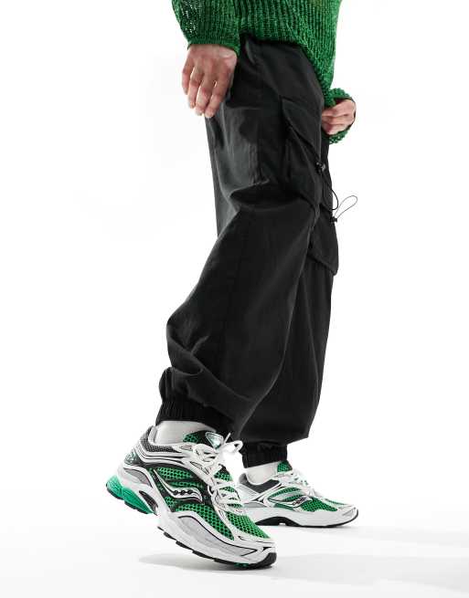 Saucony Progrid Omni 9 trainers in green and silver ASOS