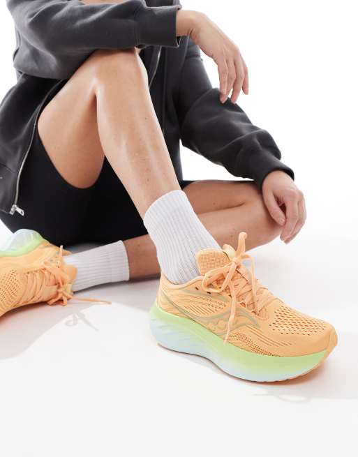 Saucony Ride 18 neutral cushioning trainers in peach and sunny | ASOS
