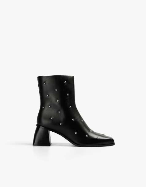 Scalpers – Banana – Mit Nieten besetzte, weiche Stiefel in Schwarz - view 1