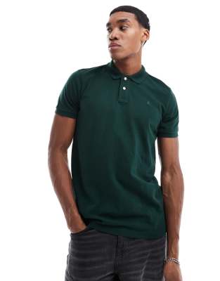 basic polo in dark green