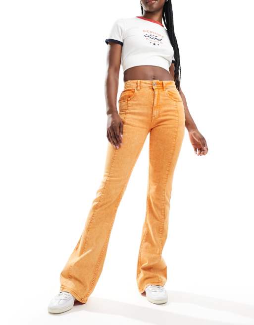 Scalpers boot cut cool denim jeans in orange