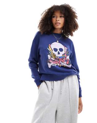 Scalpers - Bunter Pullover in Blau mit Totenkopf-Print