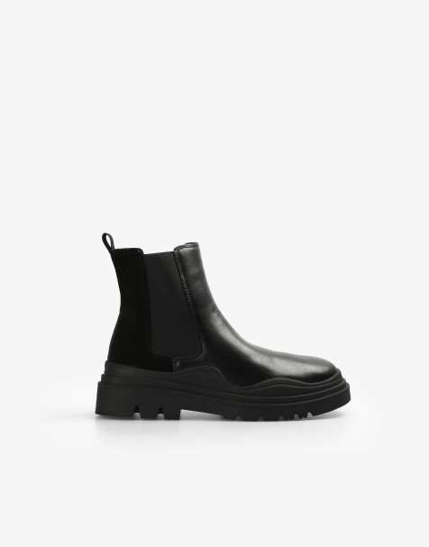 Scalpers Duotrack boots in black - view 1