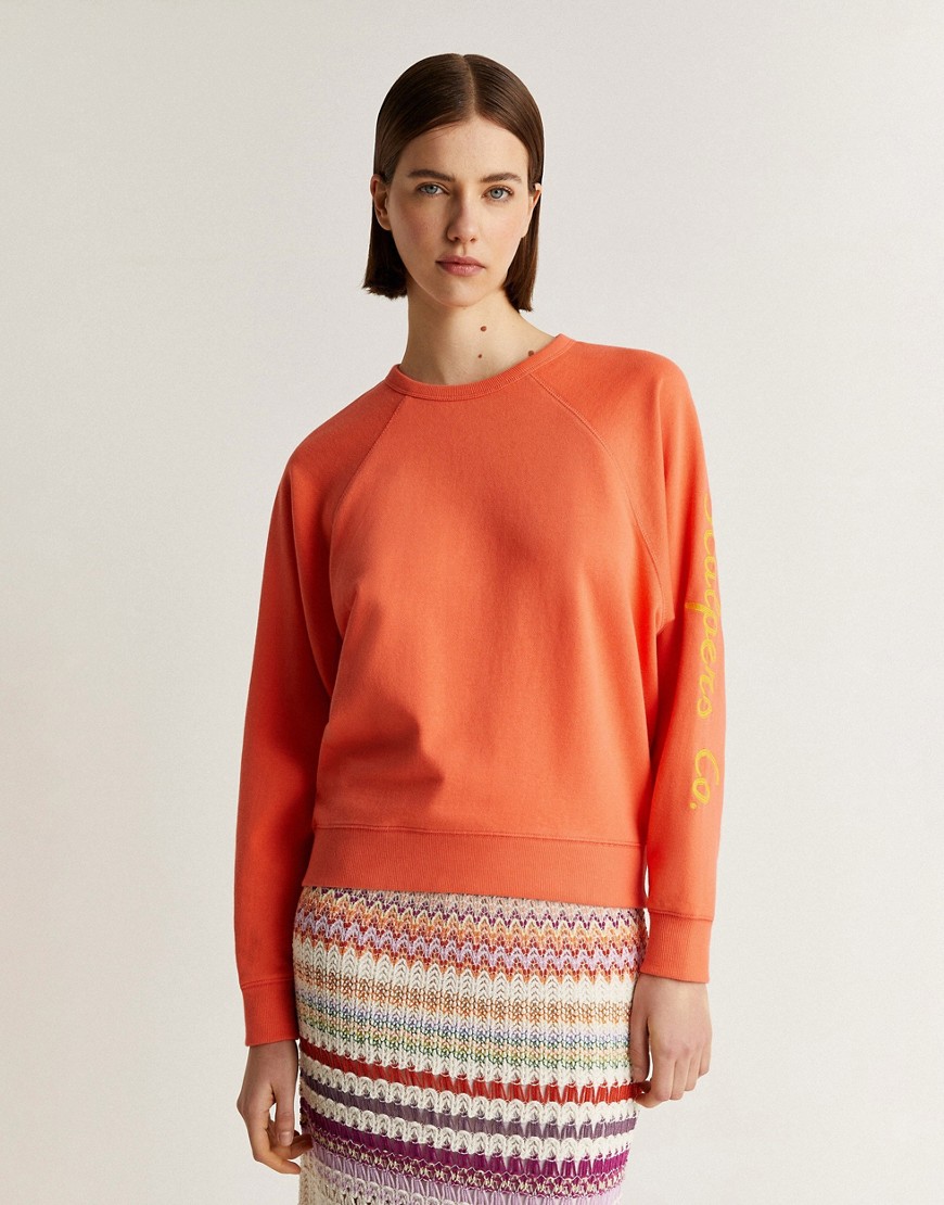 Scalpers embossed chain sweater in coral-Orange
