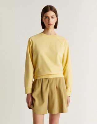 Scalpers embossed flower sweater in light yellow