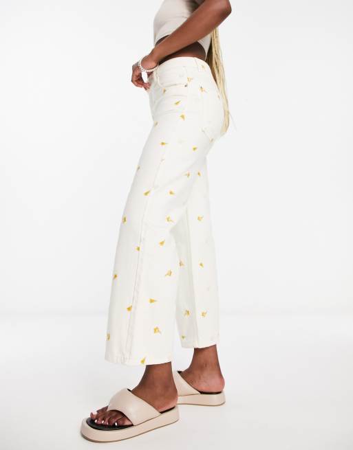 Scalpers – Jeans in Beige mit Stickerei