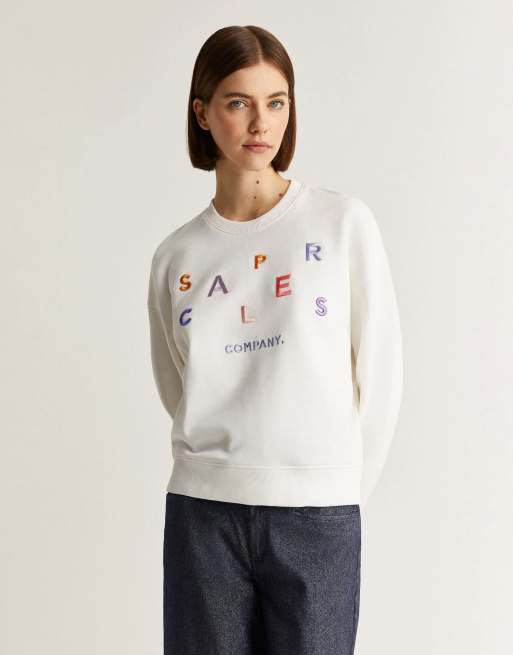 Scalpers - Maglione bianco sporco con lettere multicolore
