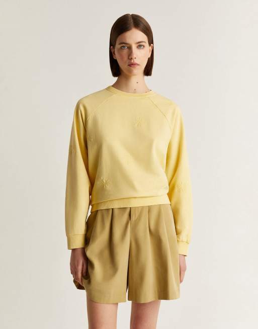 Scalpers - Maglione giallo chiaro con fiori in rilievo