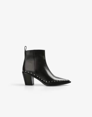 Scalpers - Mit Nieten besetzte Vintage-Stiefel in Schwarz