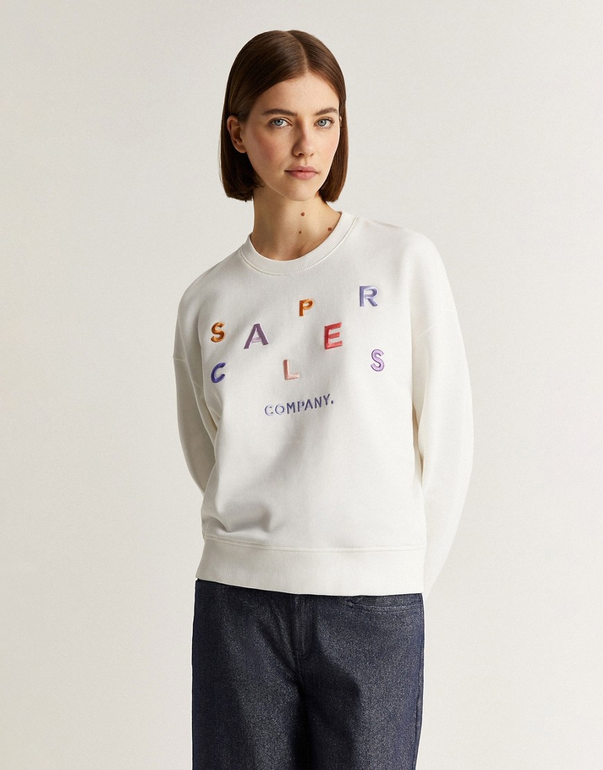 Scalpers multiletter sweater in off white