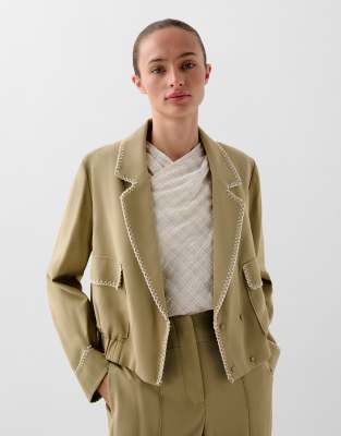 Safari stitching jacket in khaki green