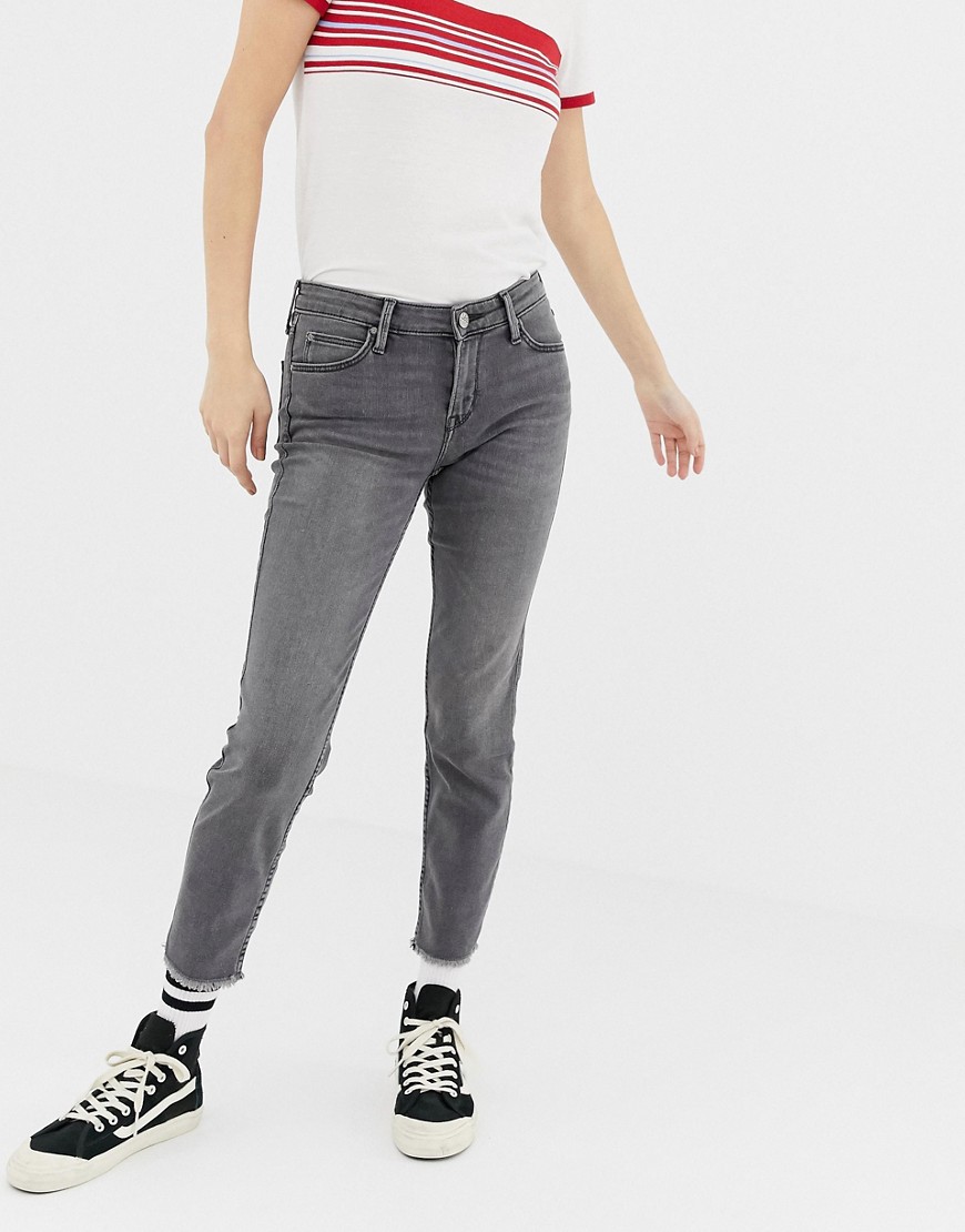 Scarlett skinny jeans med medium talje og usømmede bukseben fra Lee-Grå