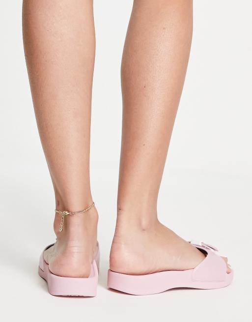 Scholl iconic Sun Eva flat sliders in all over pink ASOS