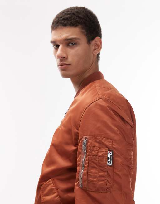 Schott - Cropped gewatteerd jack met zak met rits en ton-sur-ton logodetail in koper, 4 van 5