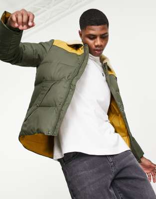 Schott Hills faux fur collar contrast yoke puffer jacket slim fit in green - ASOS Price Checker