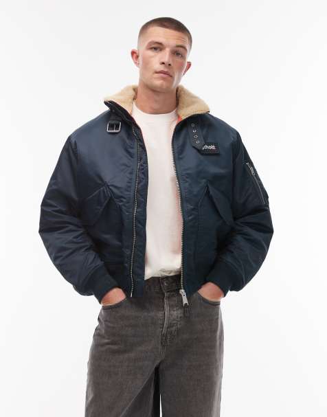 Schott logo patch zip pocket detail cropped padded buckle jacket with faux fur collar in navy - view 1