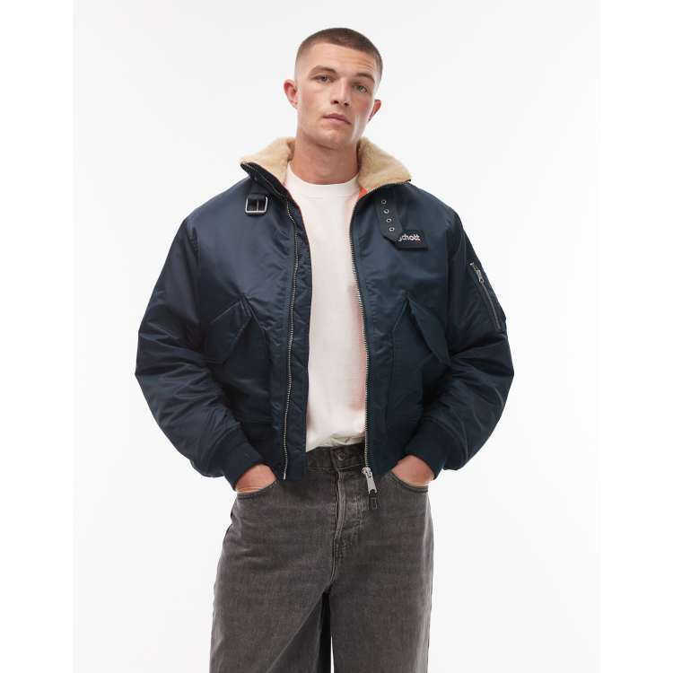Schott logo patch zip pocket detail cropped padded buckle jacket
